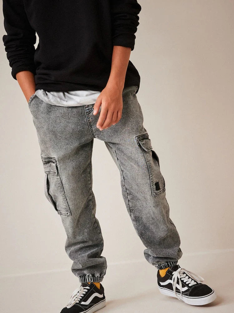 Grey jeans with cargo pockets and elastic waistband (3 to 16 years)